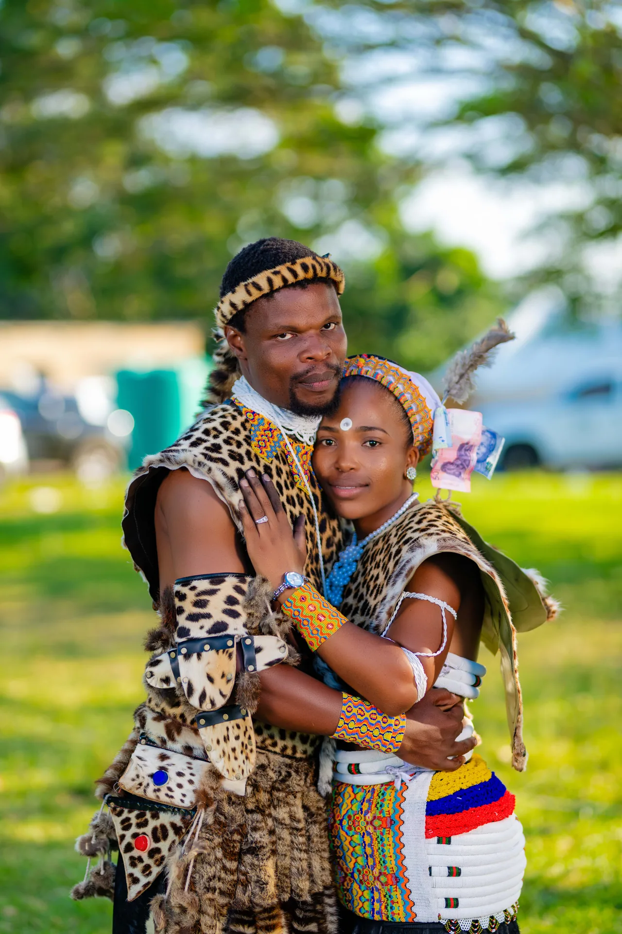Newlyweds sharing a portrait in traditional wedding attire